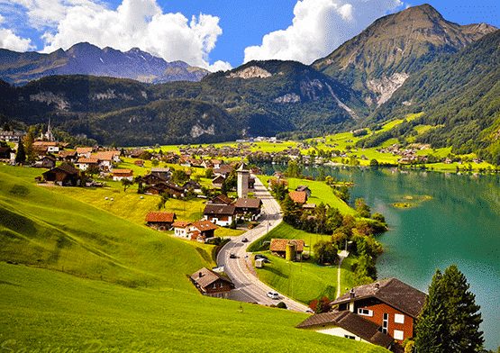 My father would send postcards that looked like this of every country he visited. This is a picture I found online of Switzerland that reminded me of one of his old postcards I still have in a box in the attic.